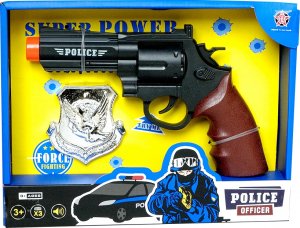Policejní pistole s odznakem